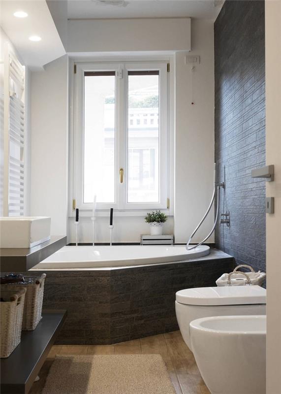 iç tasarım modern stil duvar kaplaması taş efektli fayans banyo küveti ve duş