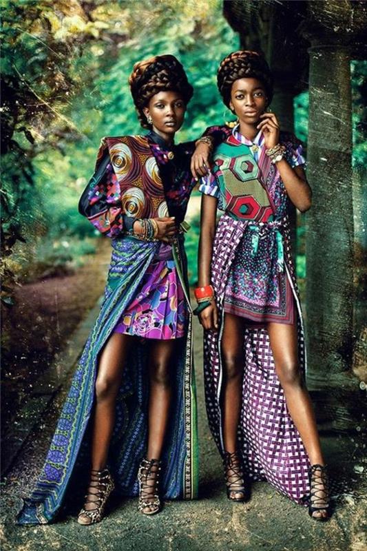 dvi moterys, dvi išvaizdos su ilgu afrikietišku sijonu, afrikietiška mada, languoti raštai, raišteliai ir spiraliniai apskritimai, mini sijonas ir ilgas sijonas