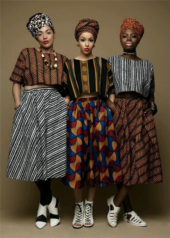 trys išvaizdos su afrikietišku sijonu ir turbanais, trys palaidinės pusiau rankovėmis, balti batai, smailūs ir su raišteliais