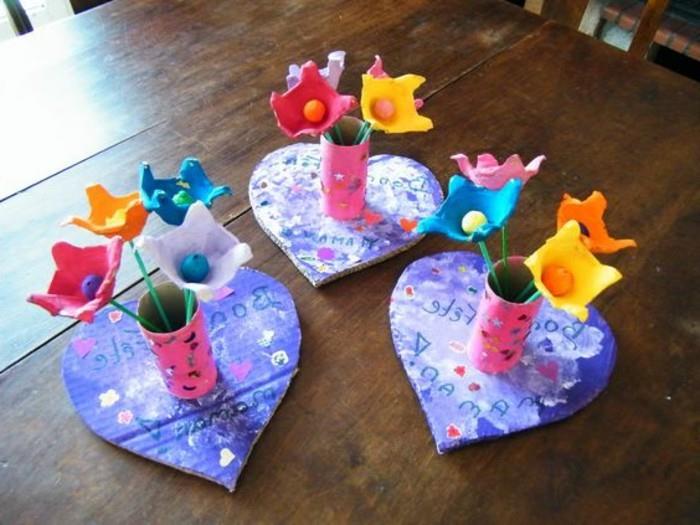 lavoretto-per-bambini-cuori-cartone-centro-vasetto-realizzato-rotolo-carta-igienica-colorato-decorato-fiori-multicolore