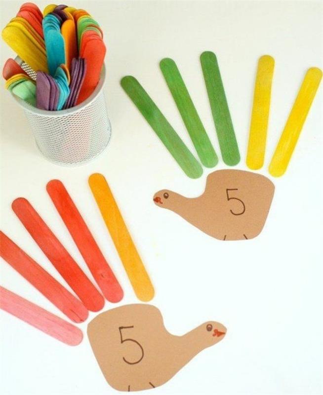 lavoretto-per-bambini-insegnare-contare-mano-dita-bastoncini-legno-colorati