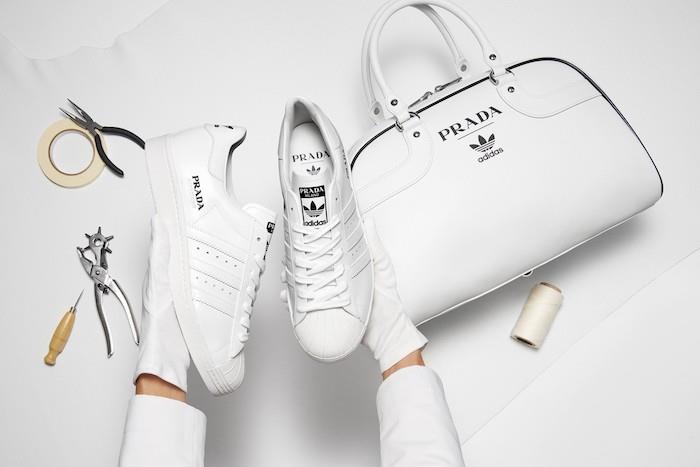 Kolekcija Prada x Adidas predstavlja par Superstar in bele usnjene kegljaške torbe Made In Italy.