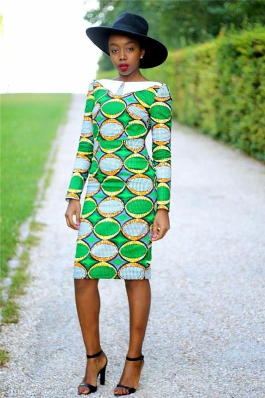 elegantiškas stilius, afrikietiška suknelė žaižaruojančiai žalia, balta ir geltona, juoda skraistė, raudona iškirptė, ilgos rankovės, iki kelių
