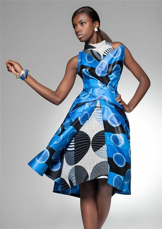 suknelės modelis su daugiasluoksniu efektu, mėlynos ir baltos spalvos, V formos iškirptė, šilkas su satino efektu, grafinių apskritimų raštai su juostelėmis