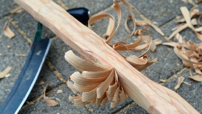 trimming-wood-in-bow-shape-first-step-of-how-to-make-a-bow-tutorial